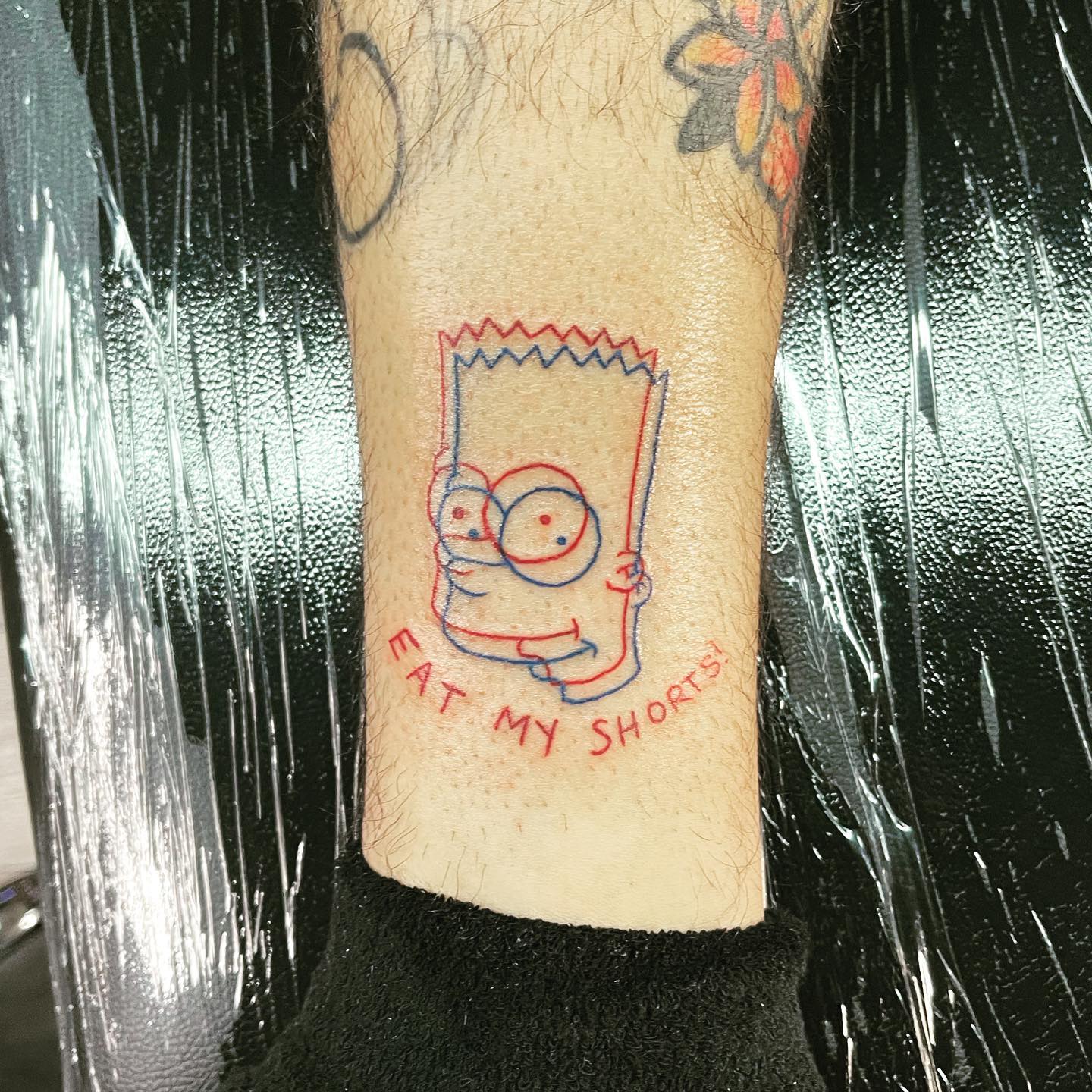 Diseño de tatuaje de los Simpsons.