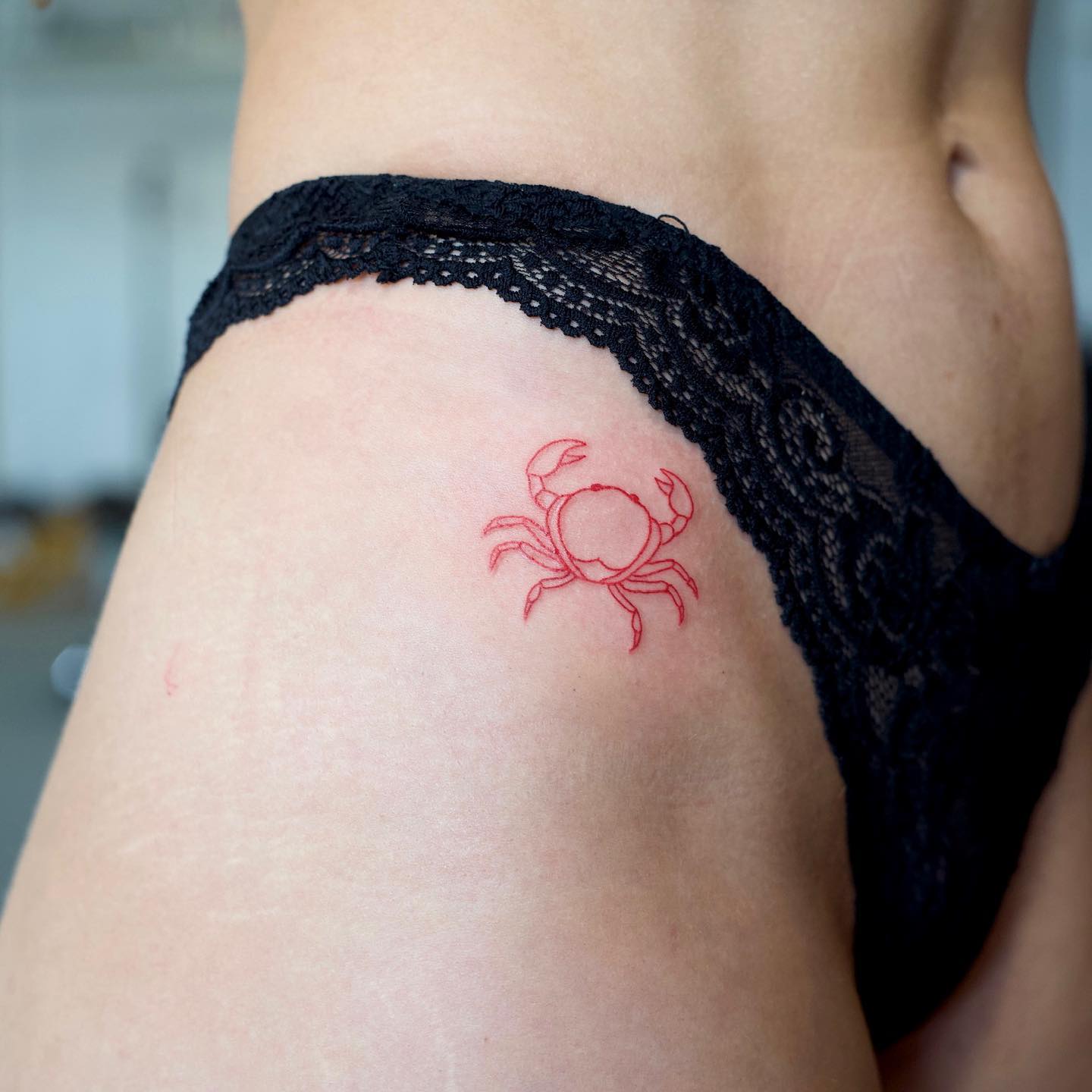 Tatuaje de Cadera de Cangrejo