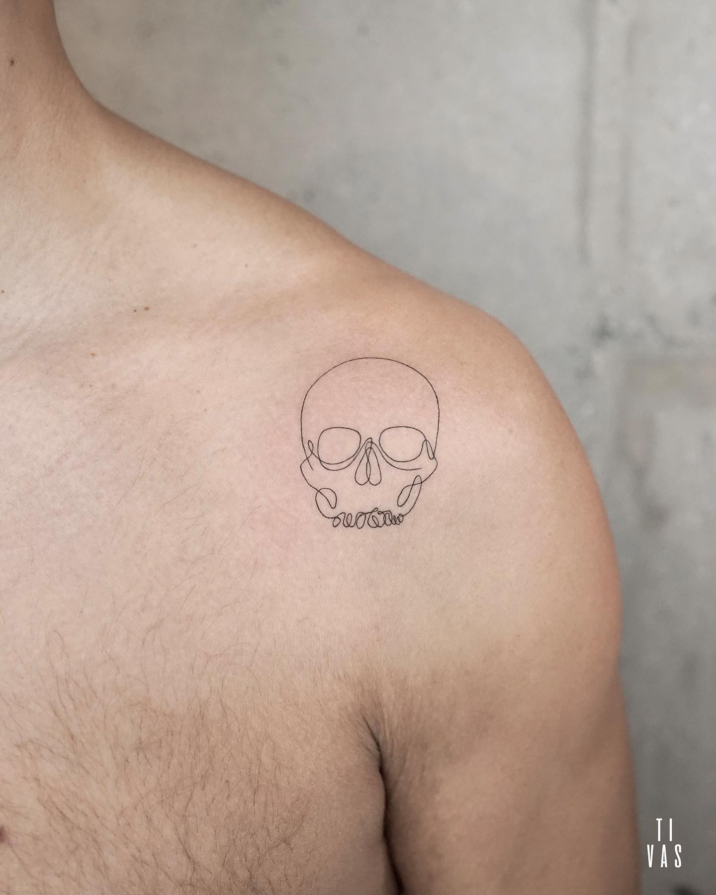 Tatuaje de cráneo pequeño