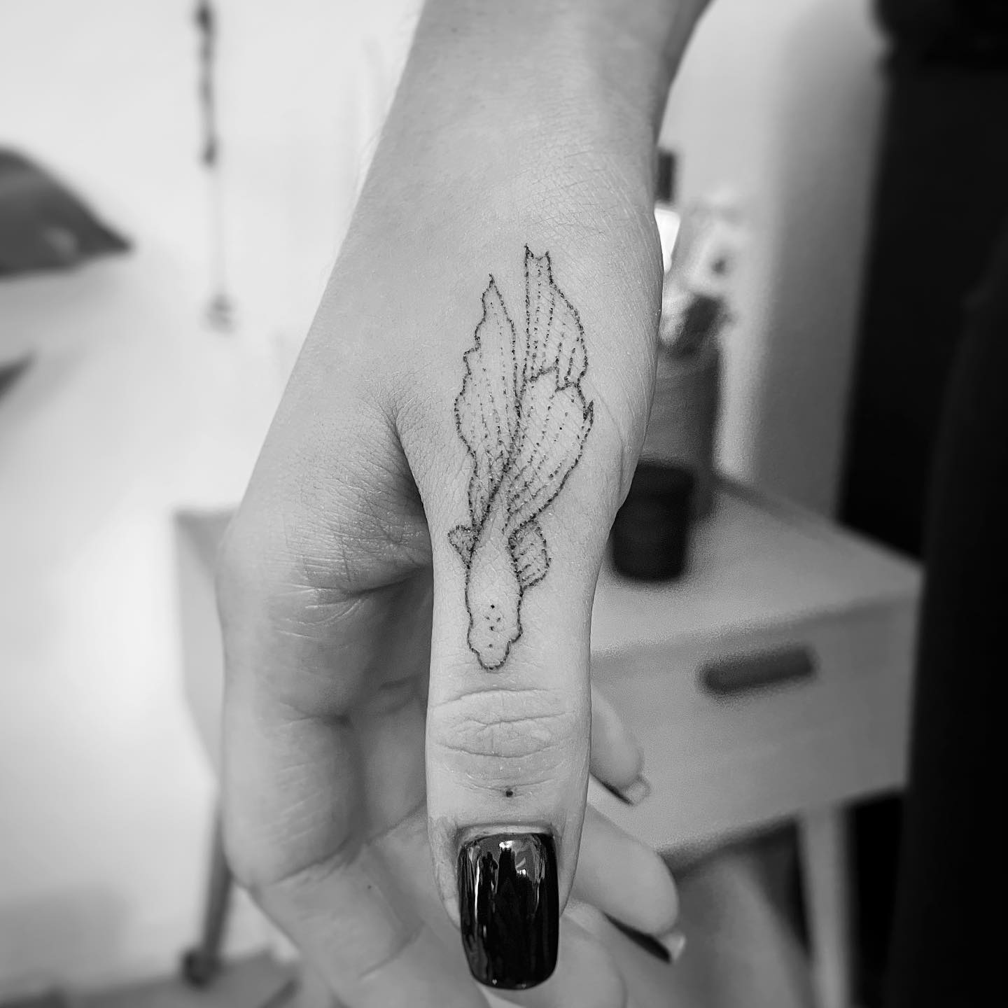 Tatuaje de la mano de la madre