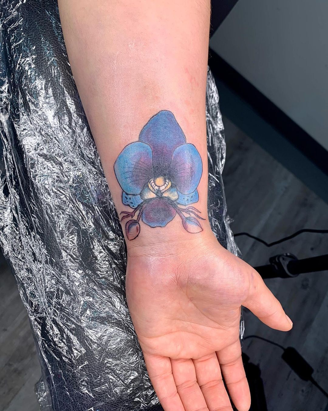Tatuaje de Orquídea Azul Brillante