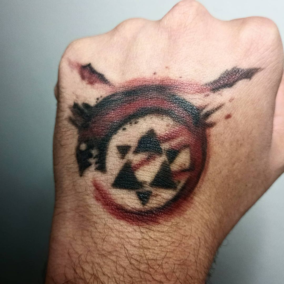Tatuaje del Ouroboros del Puño Rojo