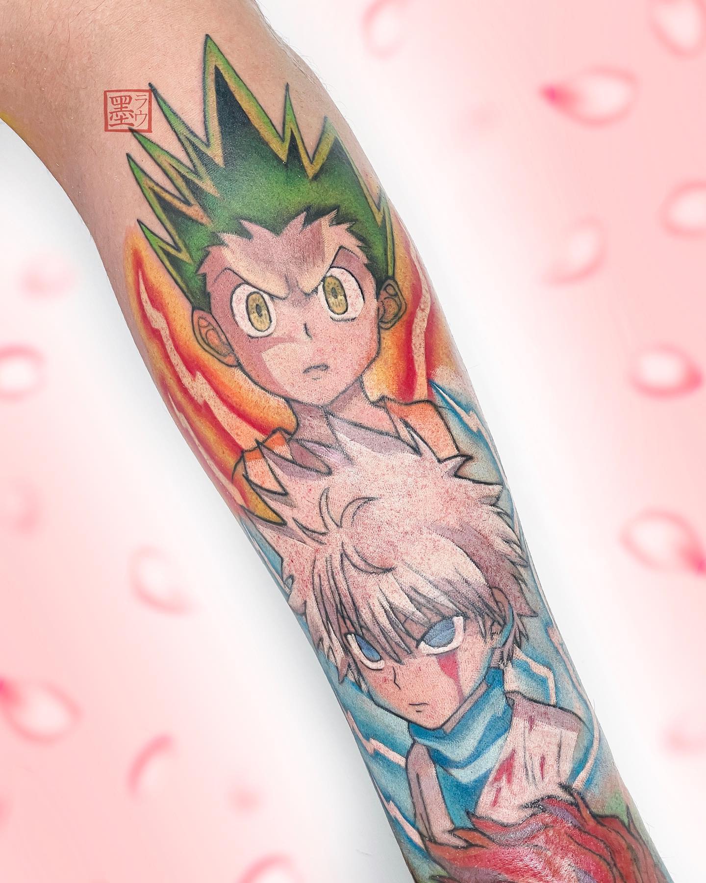 Tatuaje colorido de Gon y Killua