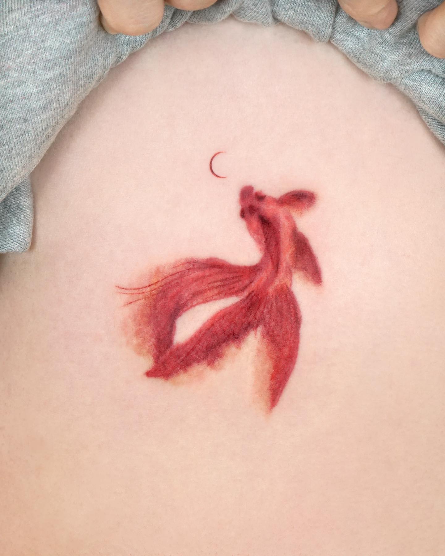 Tatuaje de cubierta de pez rojo