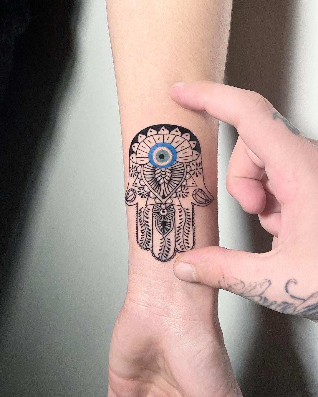 Tatuaje de Jamsa de color azul