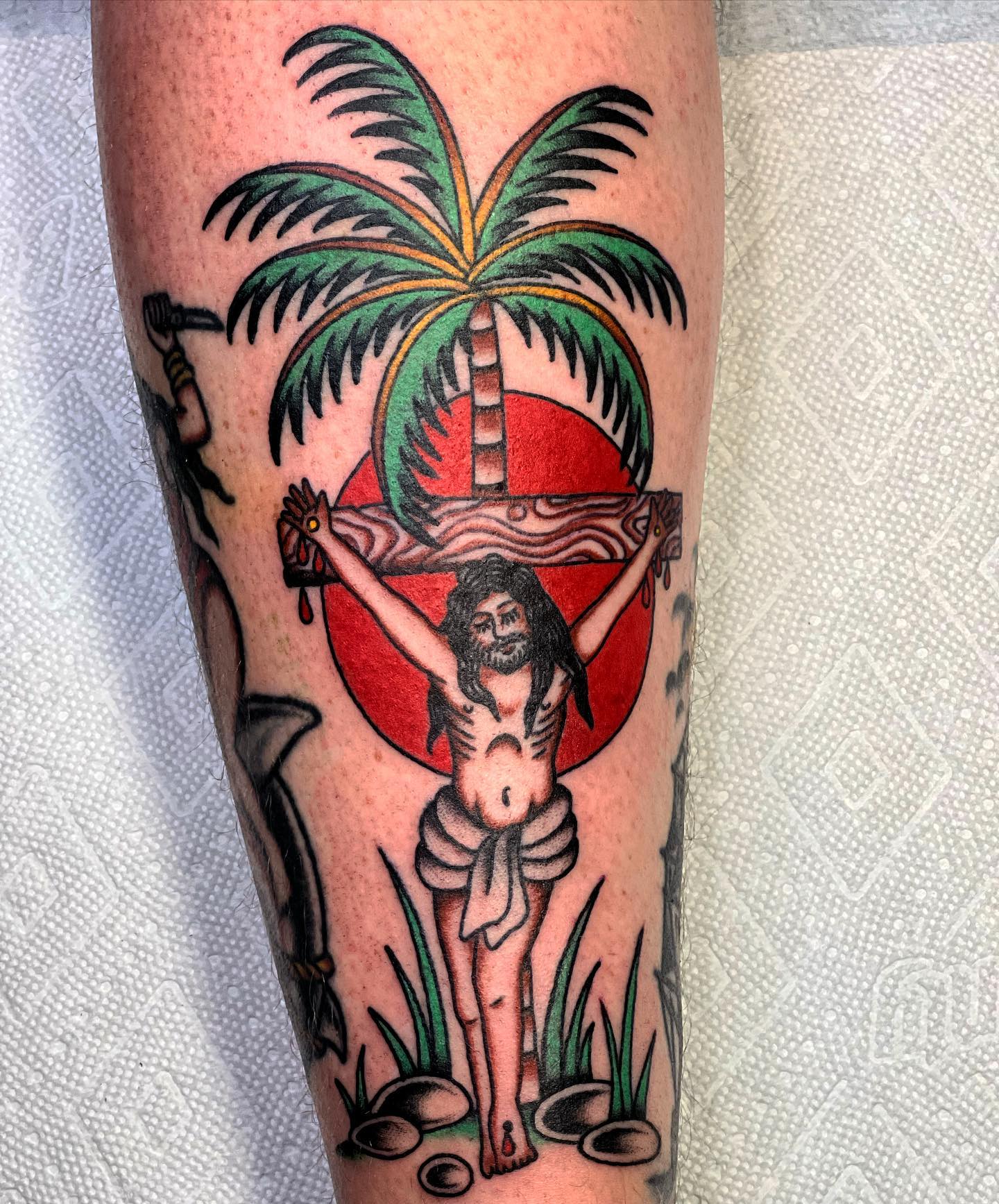 Tatuaje de Jesús y Palma