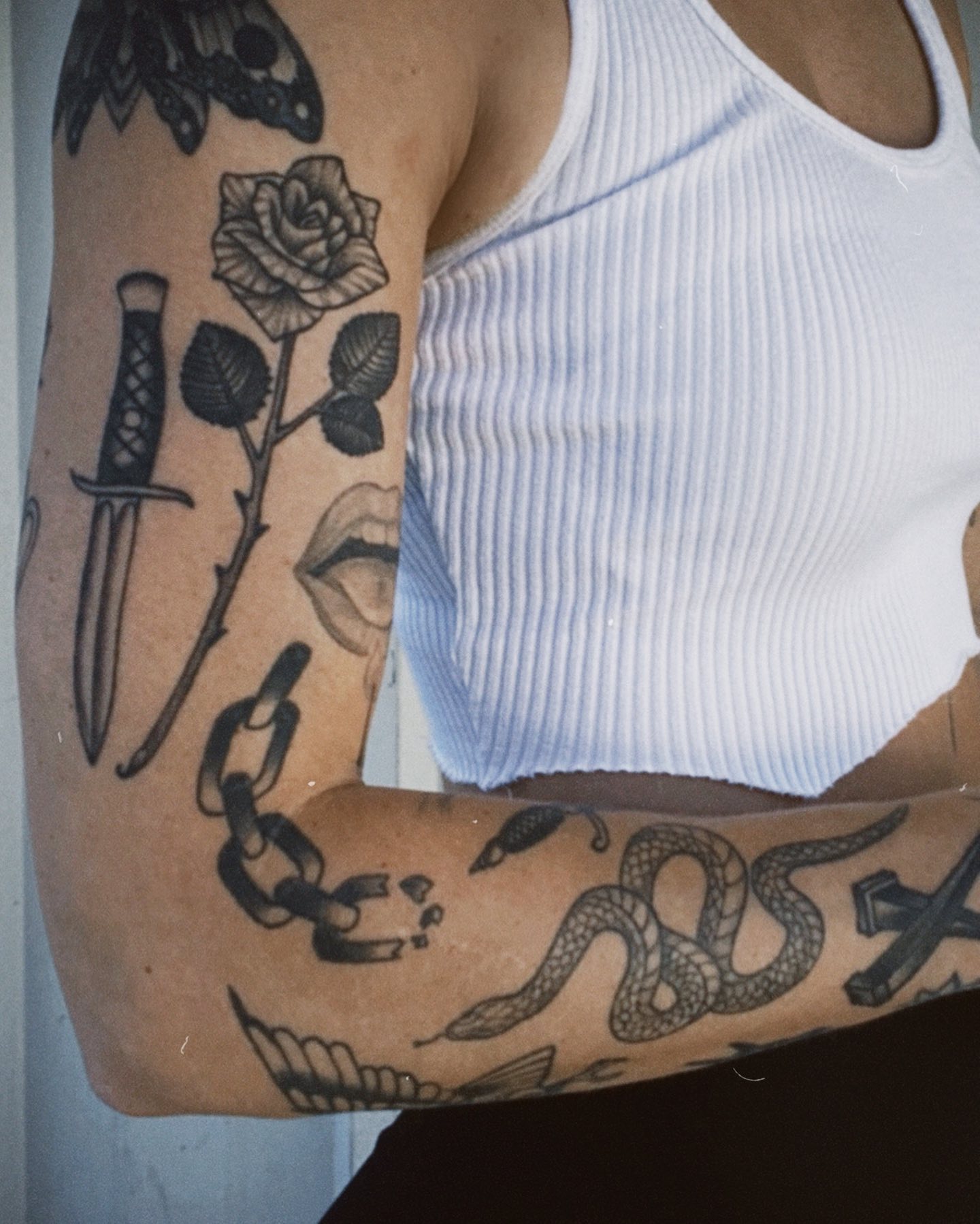 Tatuaje de Patchwork en todo el brazo.