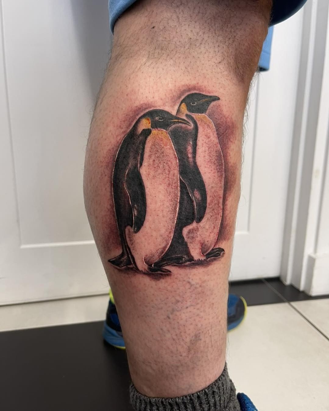 Tatuaje de pingüinos en pareja