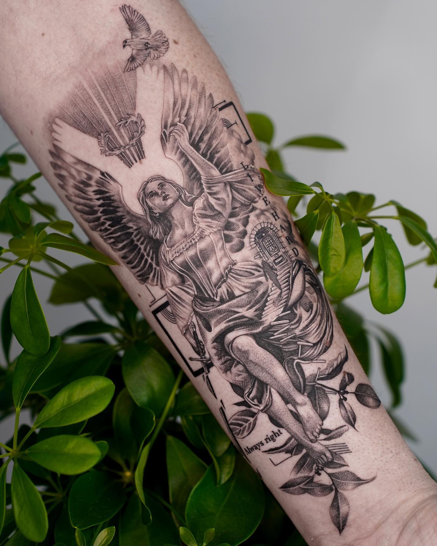 Ala de Tatuaje Religioso