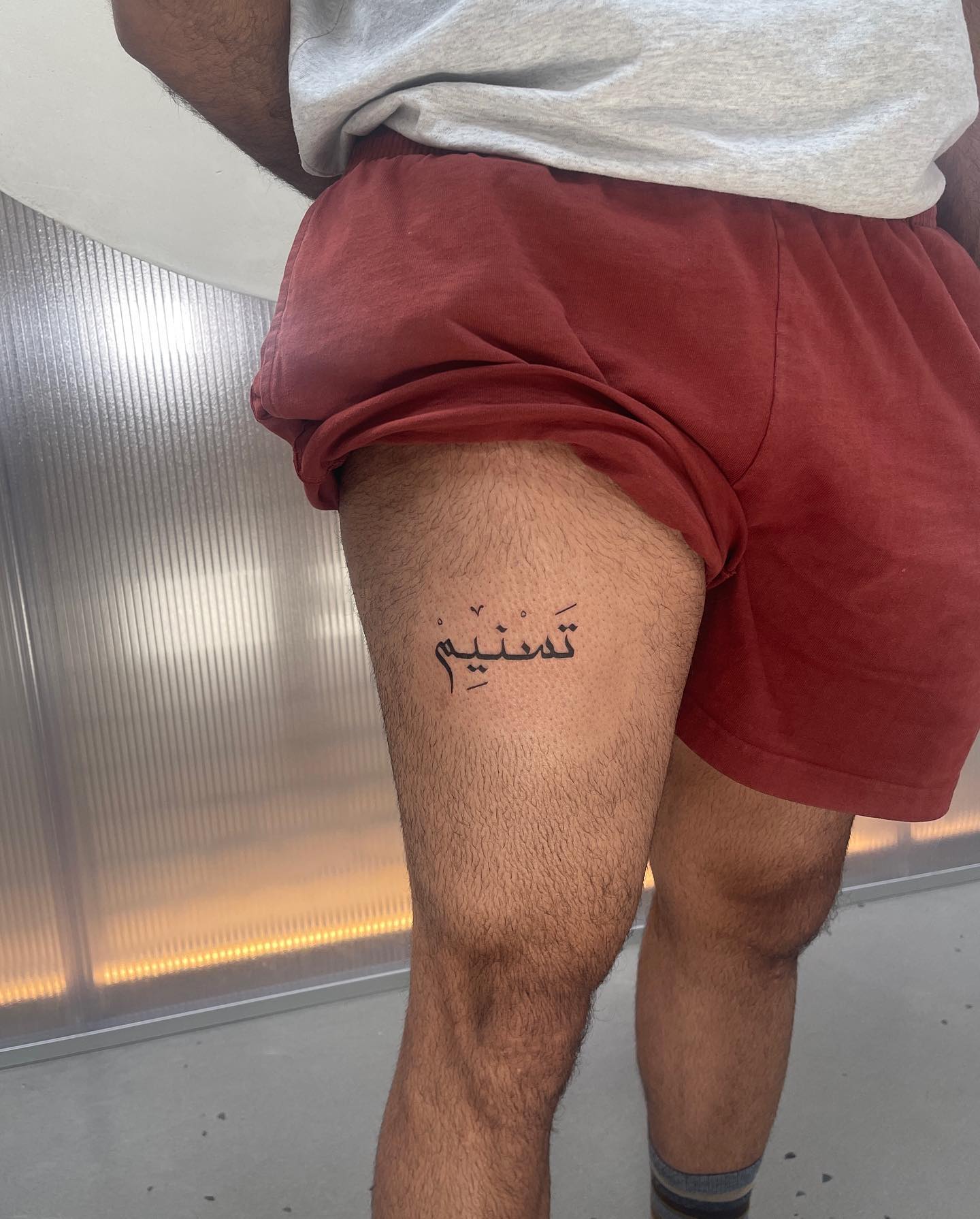 Tatuaje árabe de Tasnim