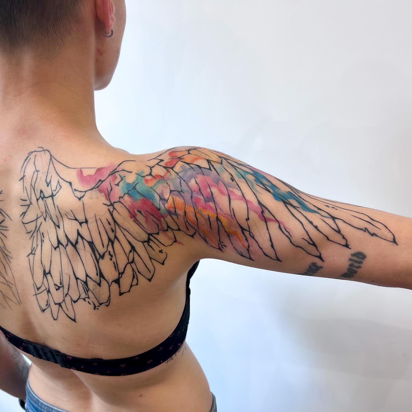 Tatuaje de Ala Artístico
