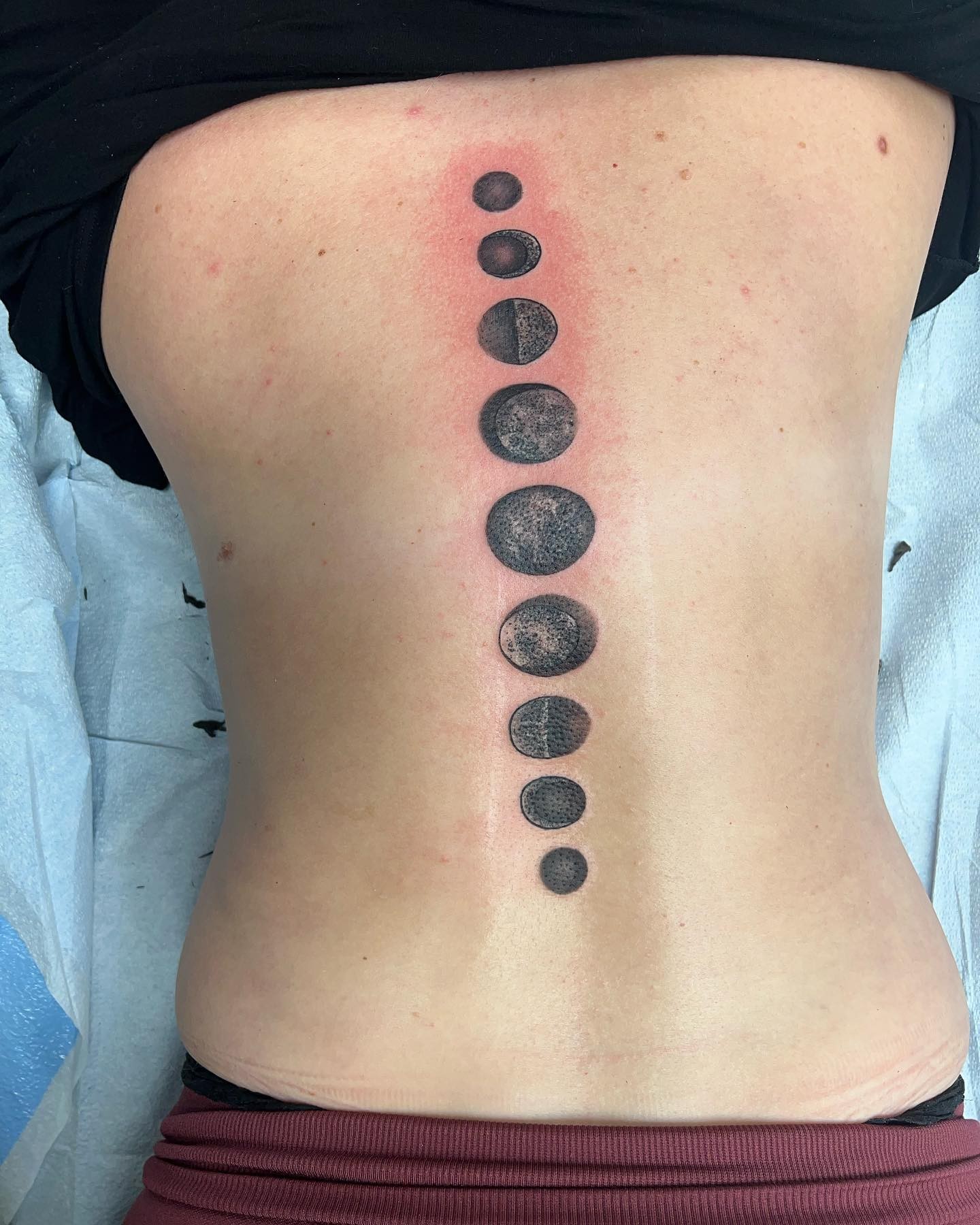 Tatuaje de columna lunar