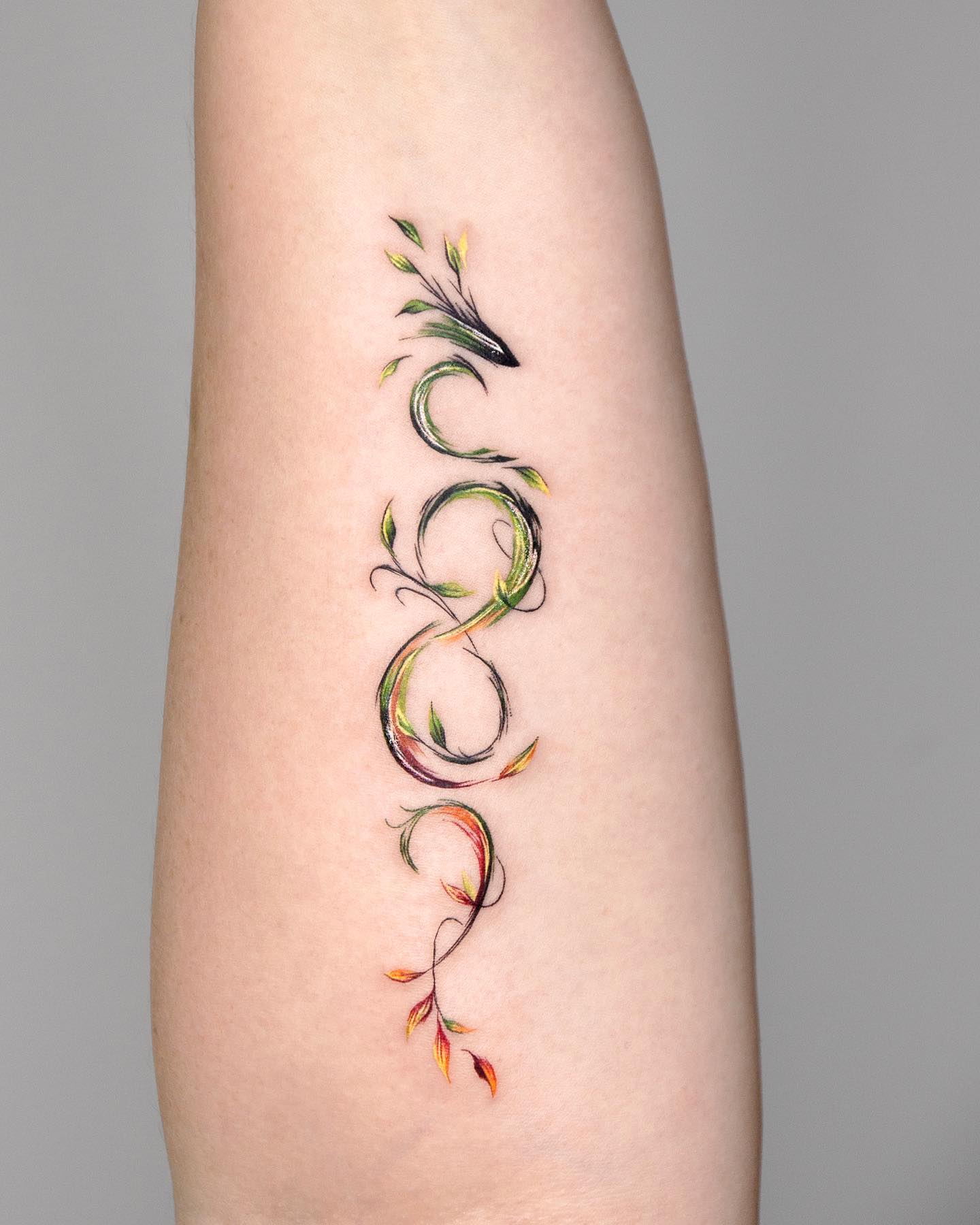 Tatuaje de infinito artístico único