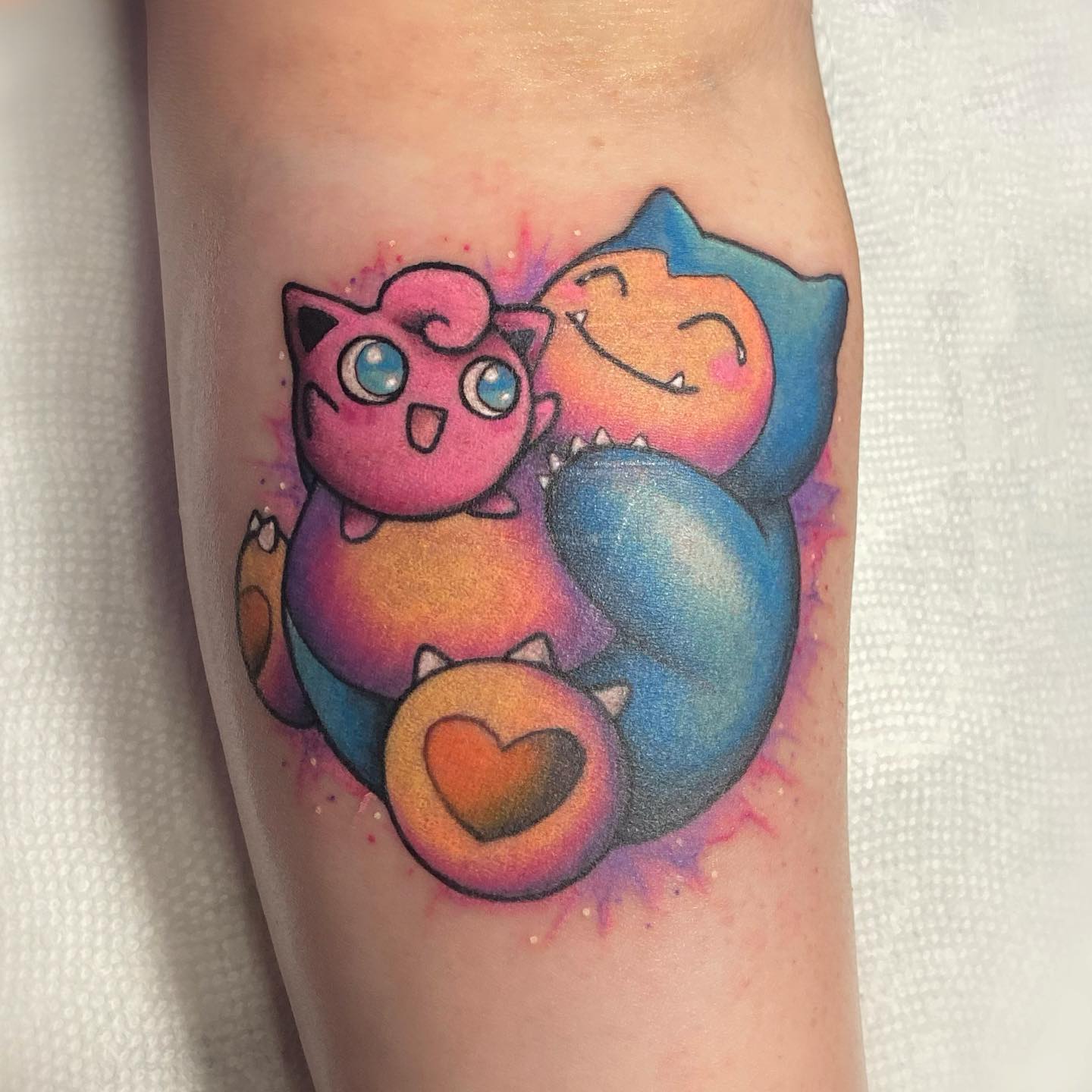 Tatuaje de pareja de Pokémon.