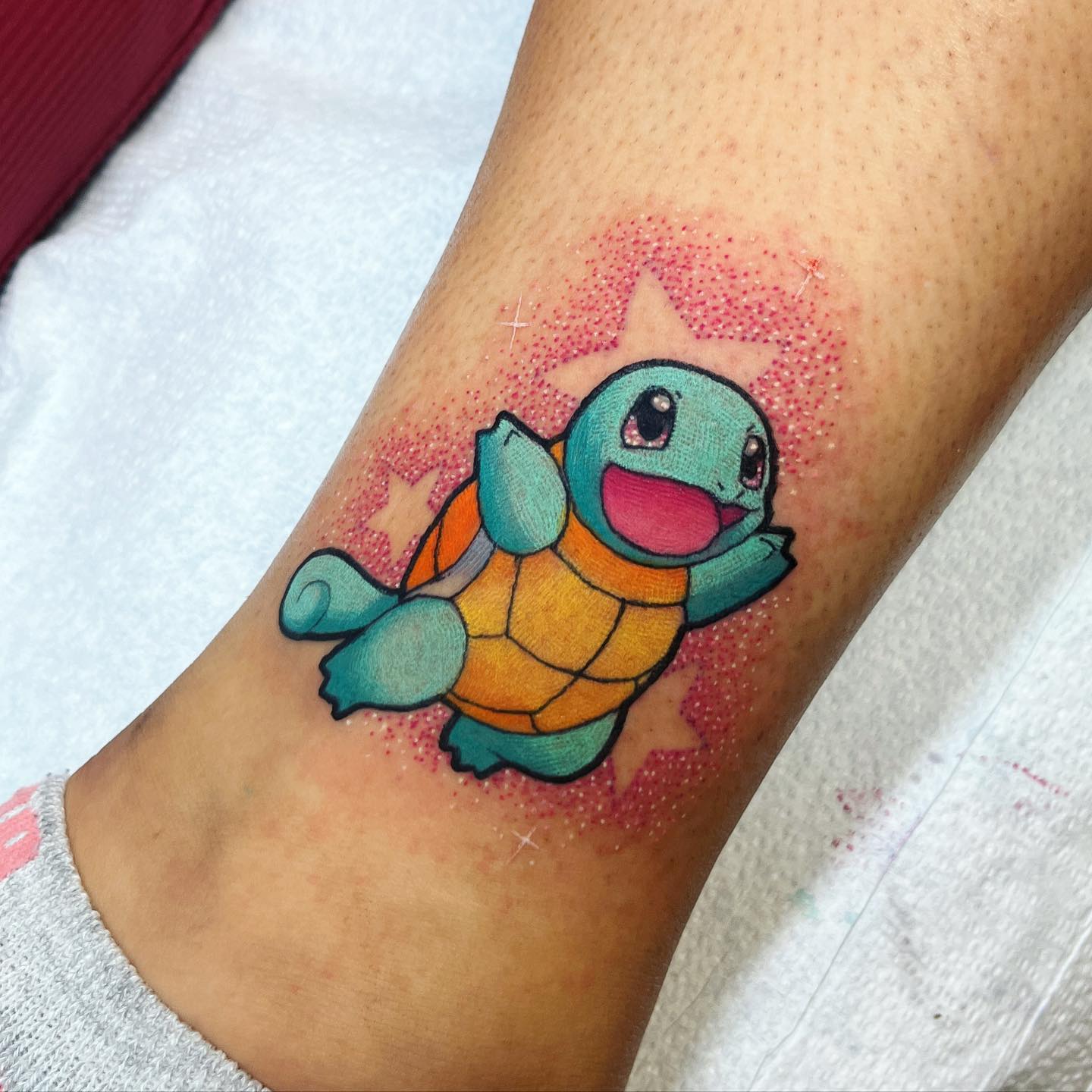 Tatuaje de Pokemon con brillantina