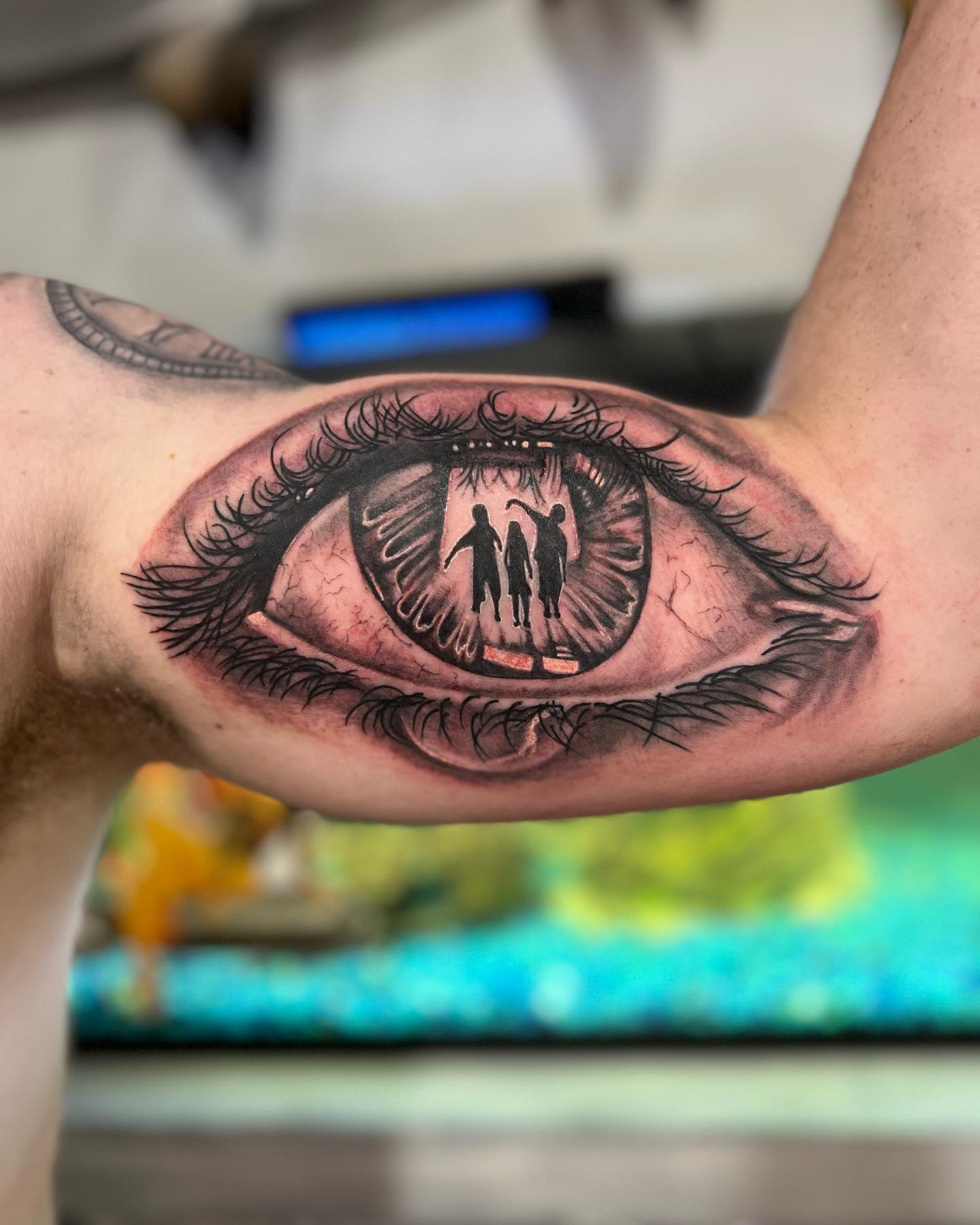 Símbolo del ojo Tatuaje de bíceps