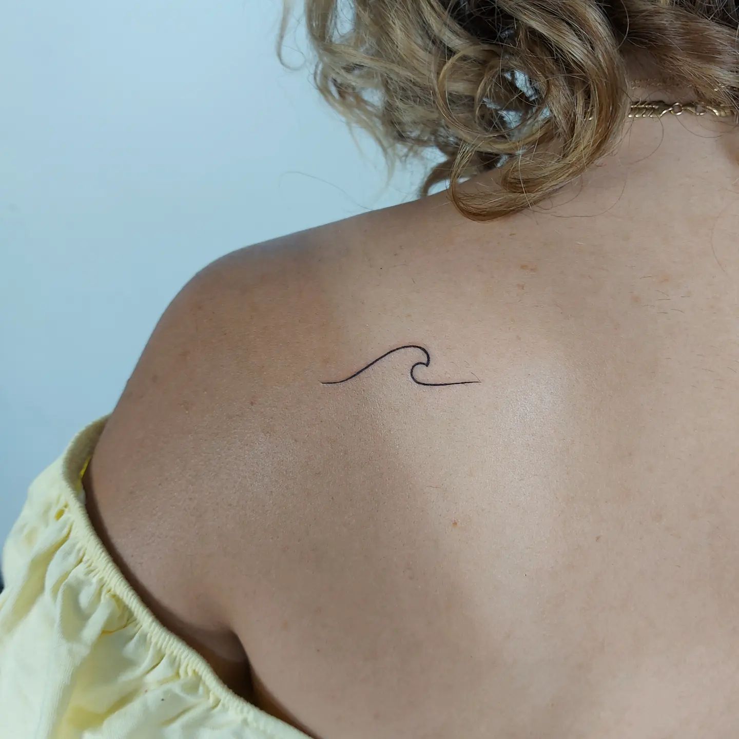 Ola Tatuaje en la Espalda