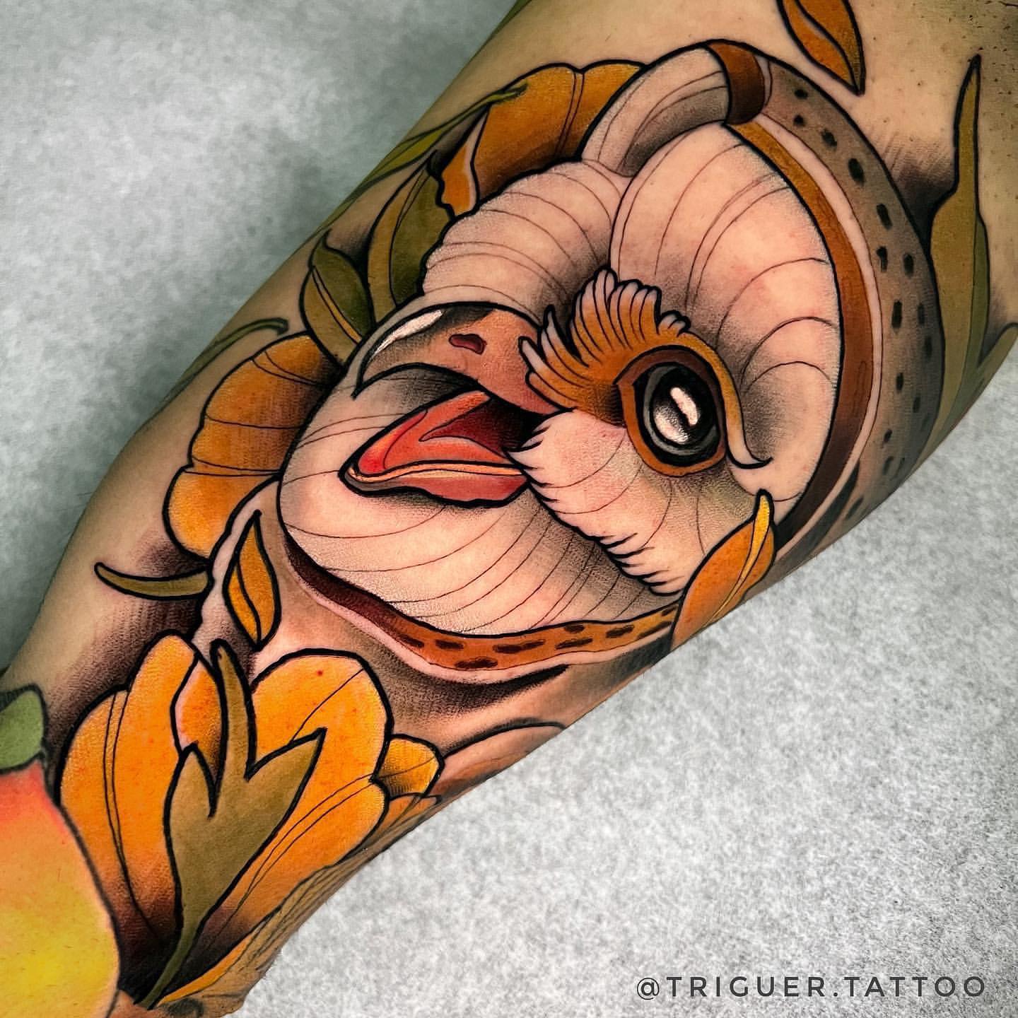 Tatuaje creativo de búho