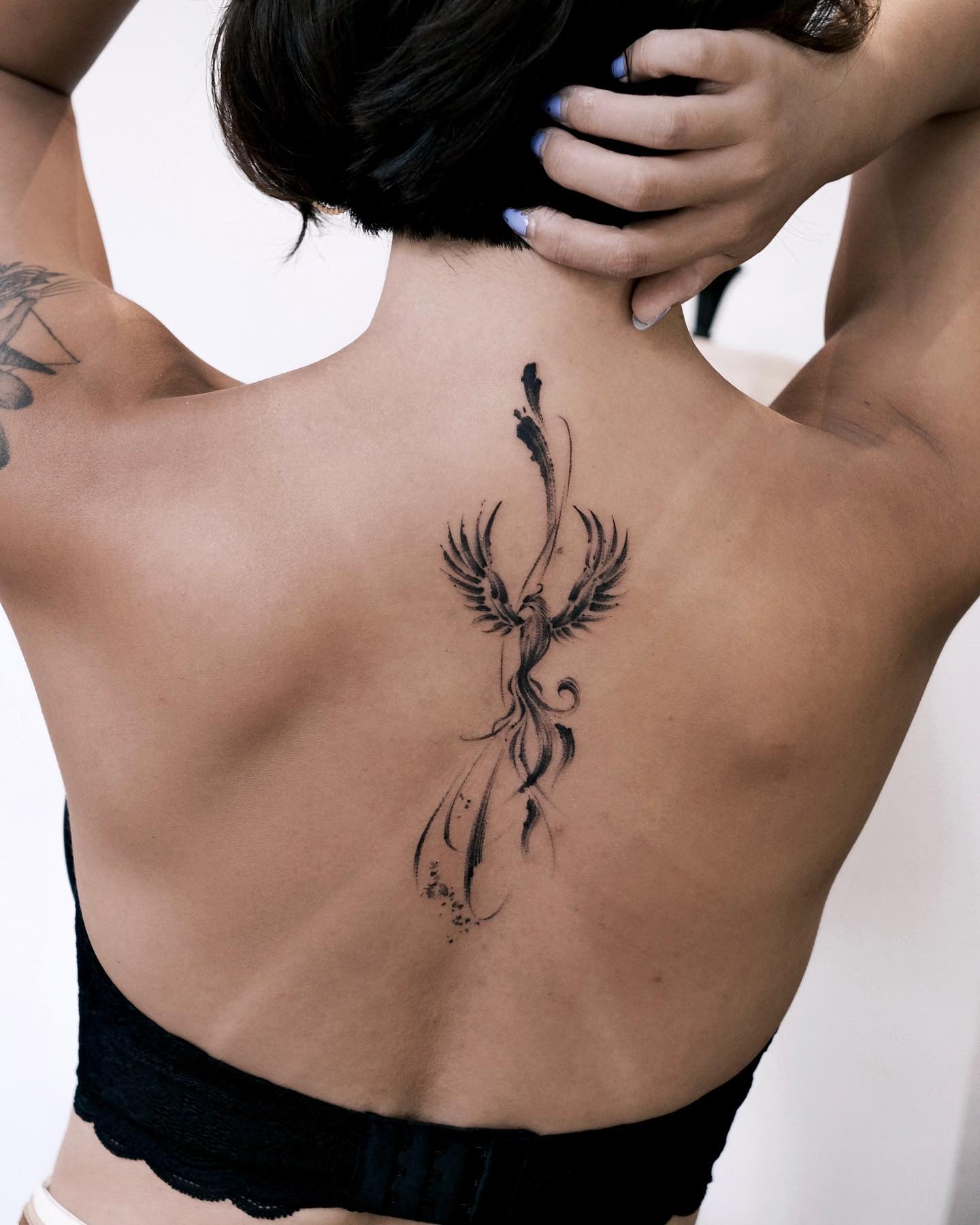Tatuaje de Pájaro Genial en la Espalda
