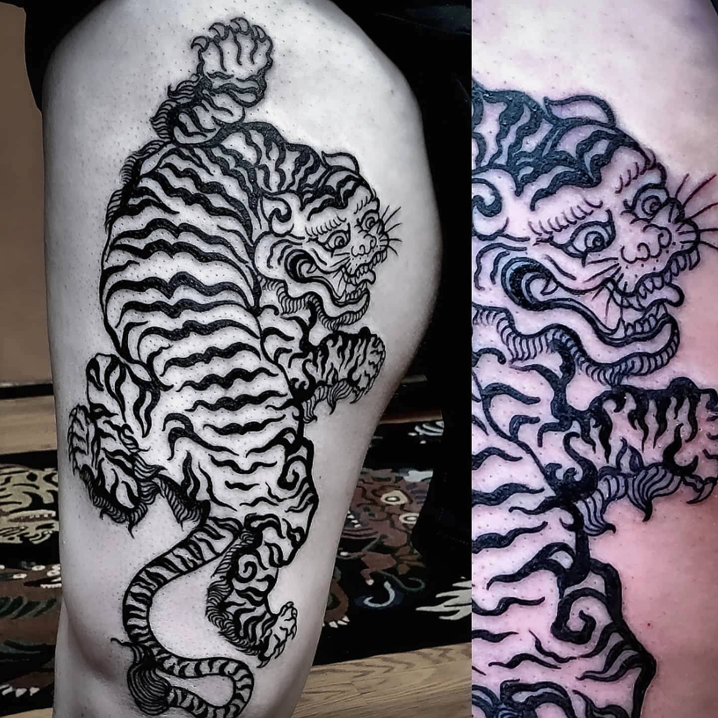 Tatuaje tradicional de muslo de tigre para hombres.