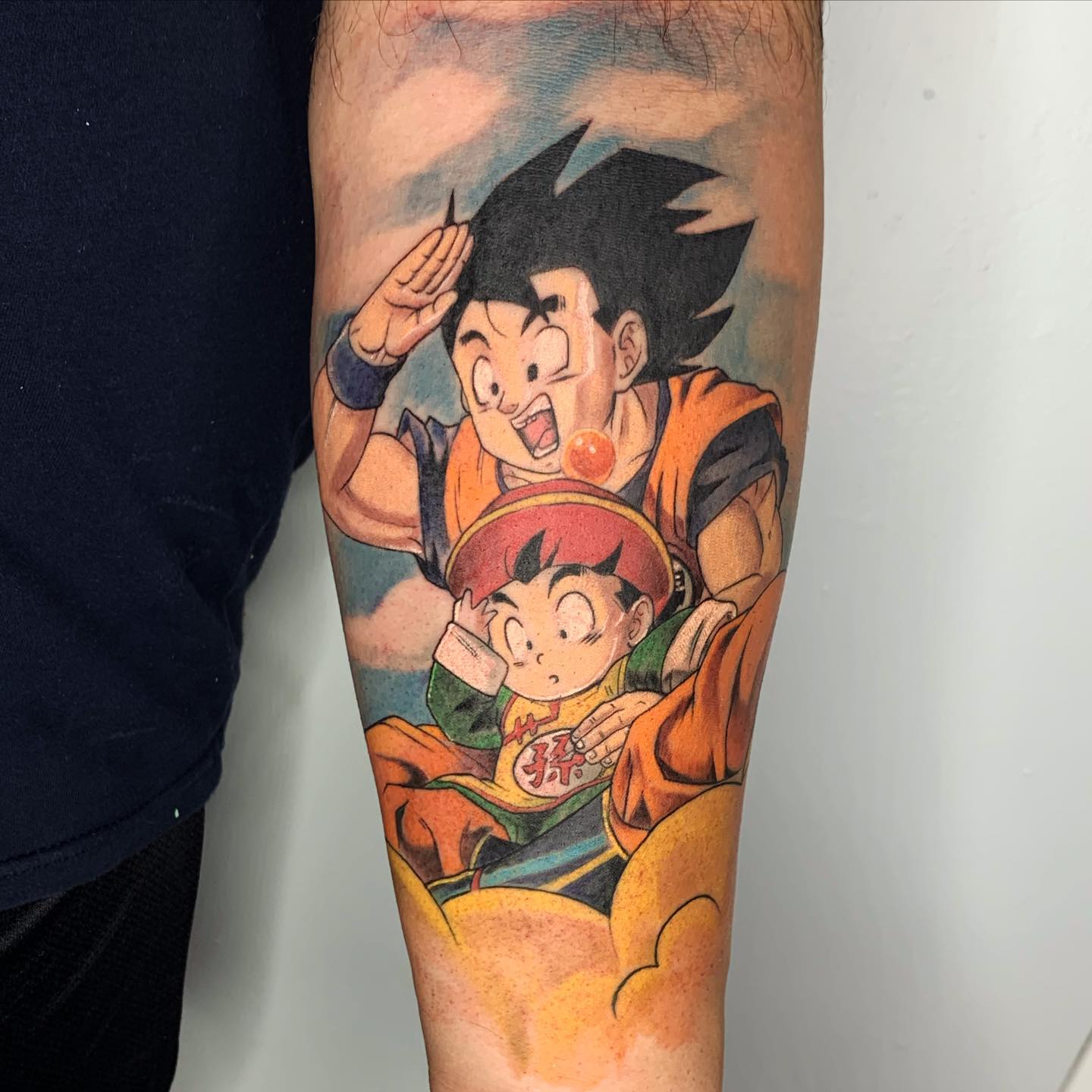 Tatuaje de Goku y Baby Gohan