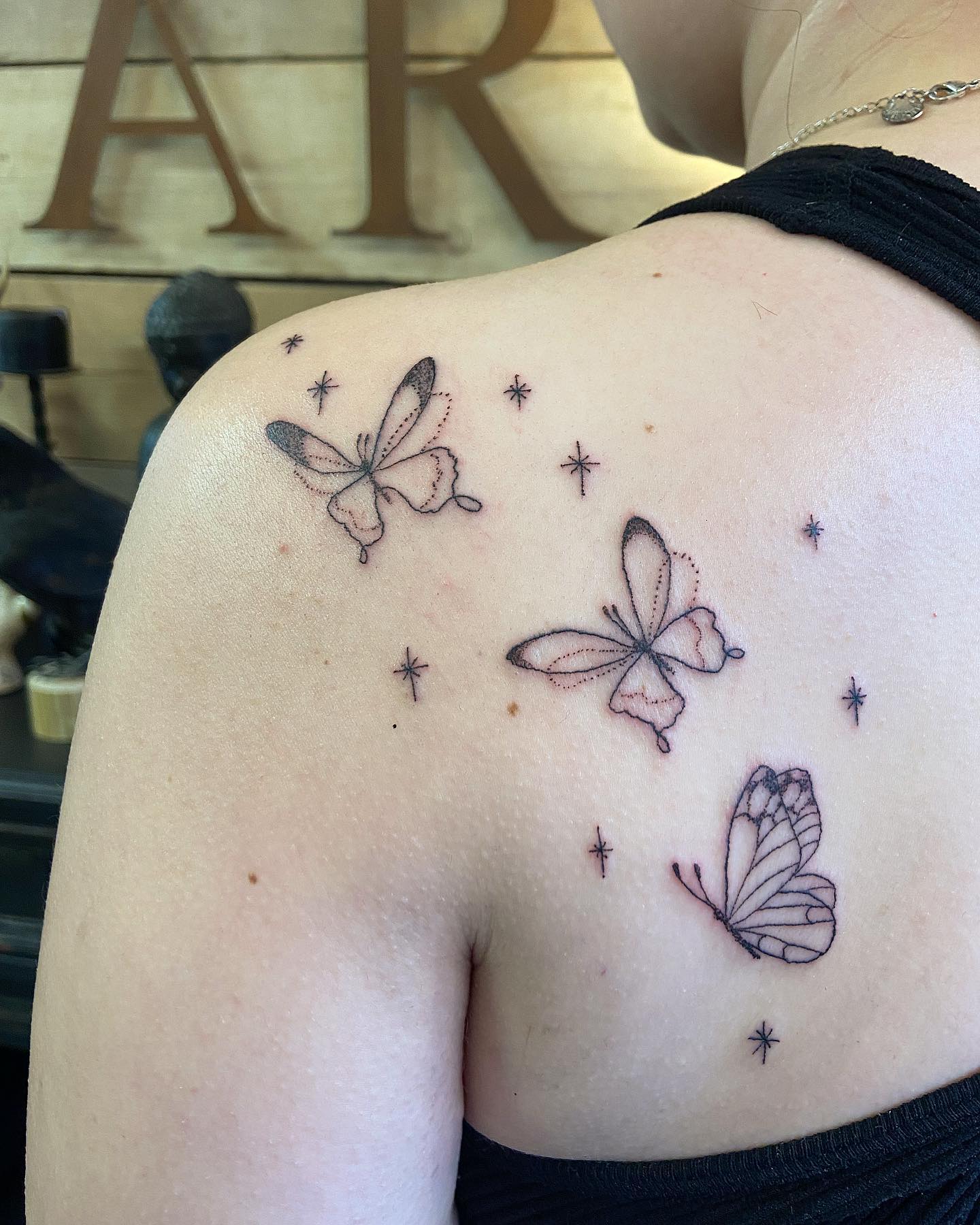 Tatuaje de Mariposa Triple