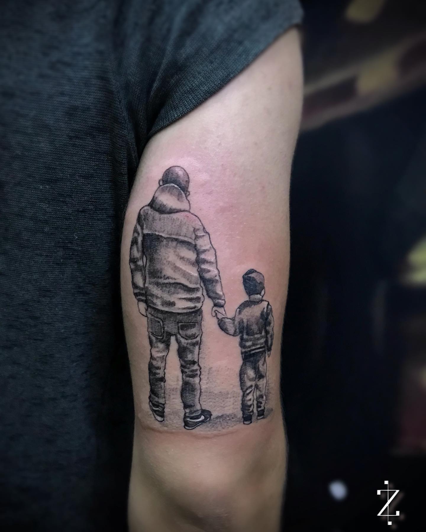Tatuaje de padre e hijo sombreado