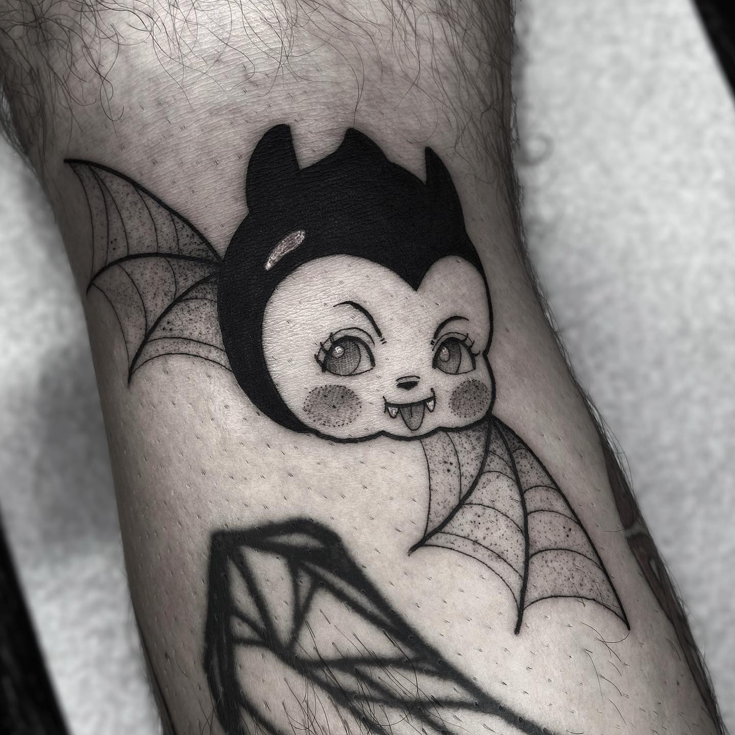 Tatuaje de murciélago de caricatura
