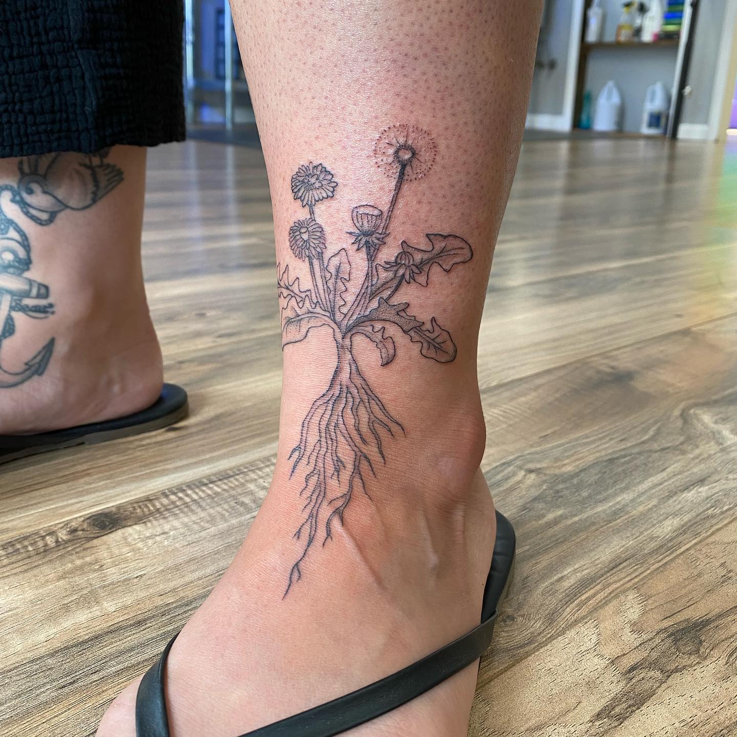 Tatuaje de Diente de León en el pie