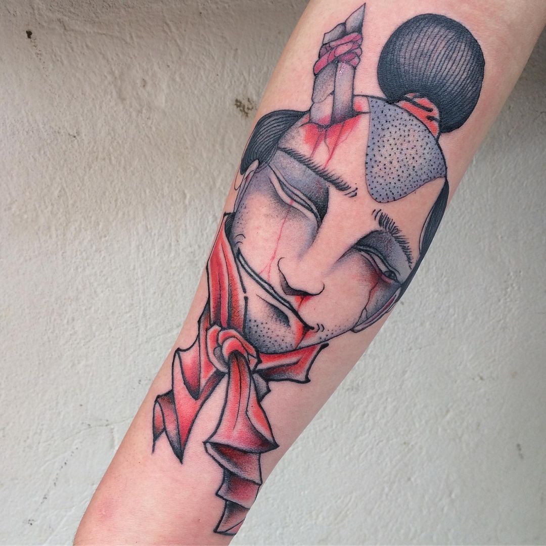 Tatuaje de Duo Namakubi en Negro y Rojo