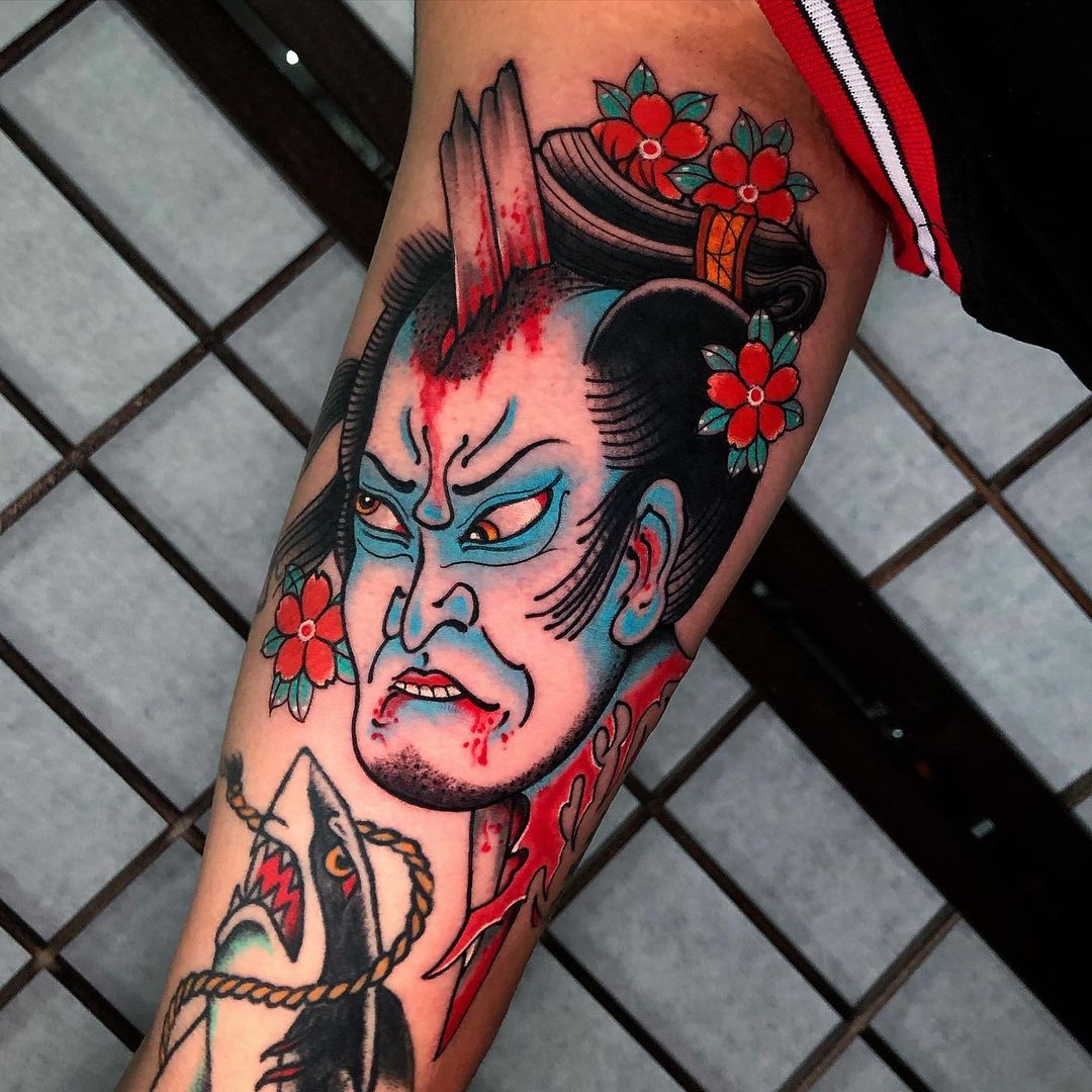 Tatuaje de Namakubi Rojo y Azul