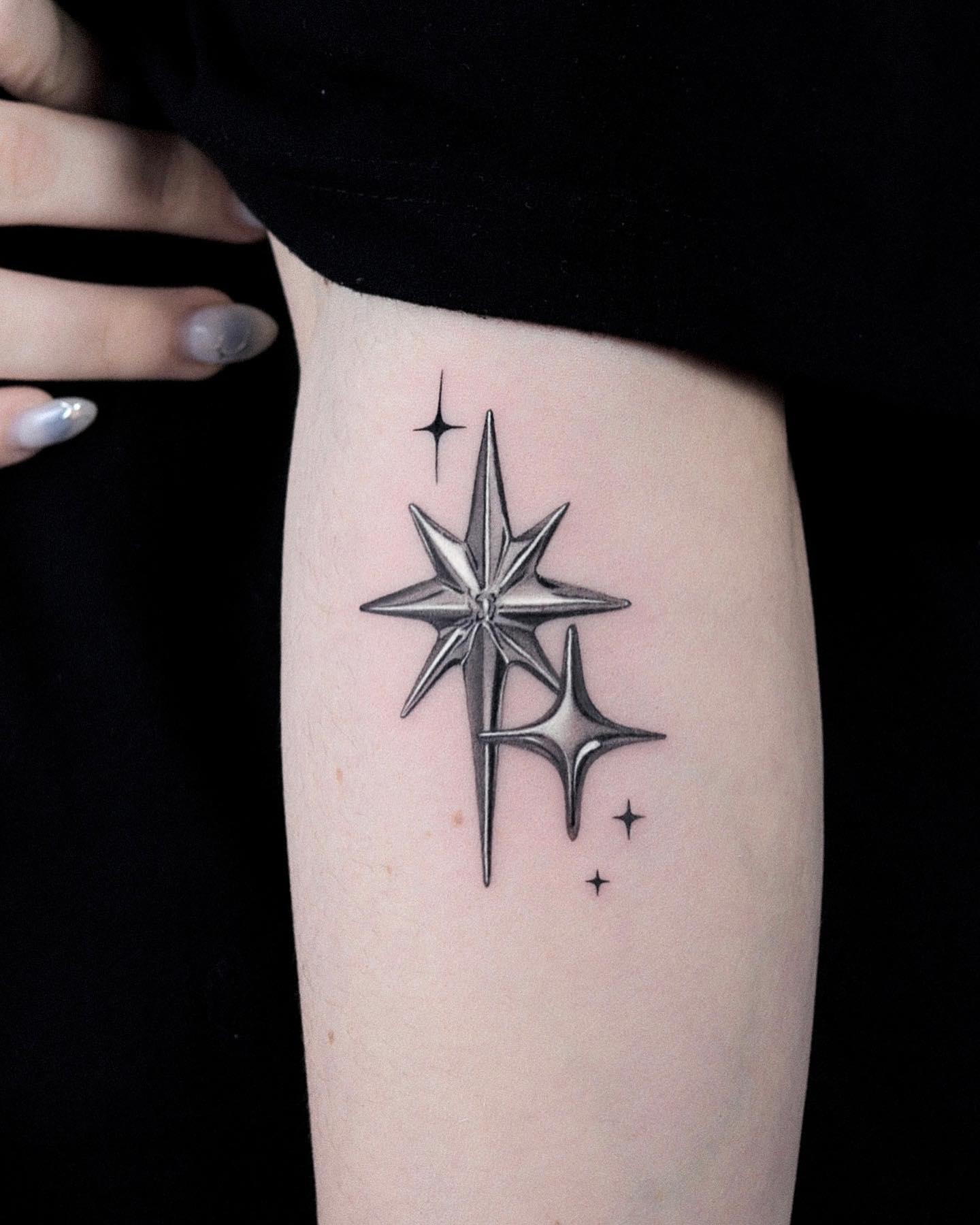 Tatuaje del Estrella Polar Tridimensional en el Brazo