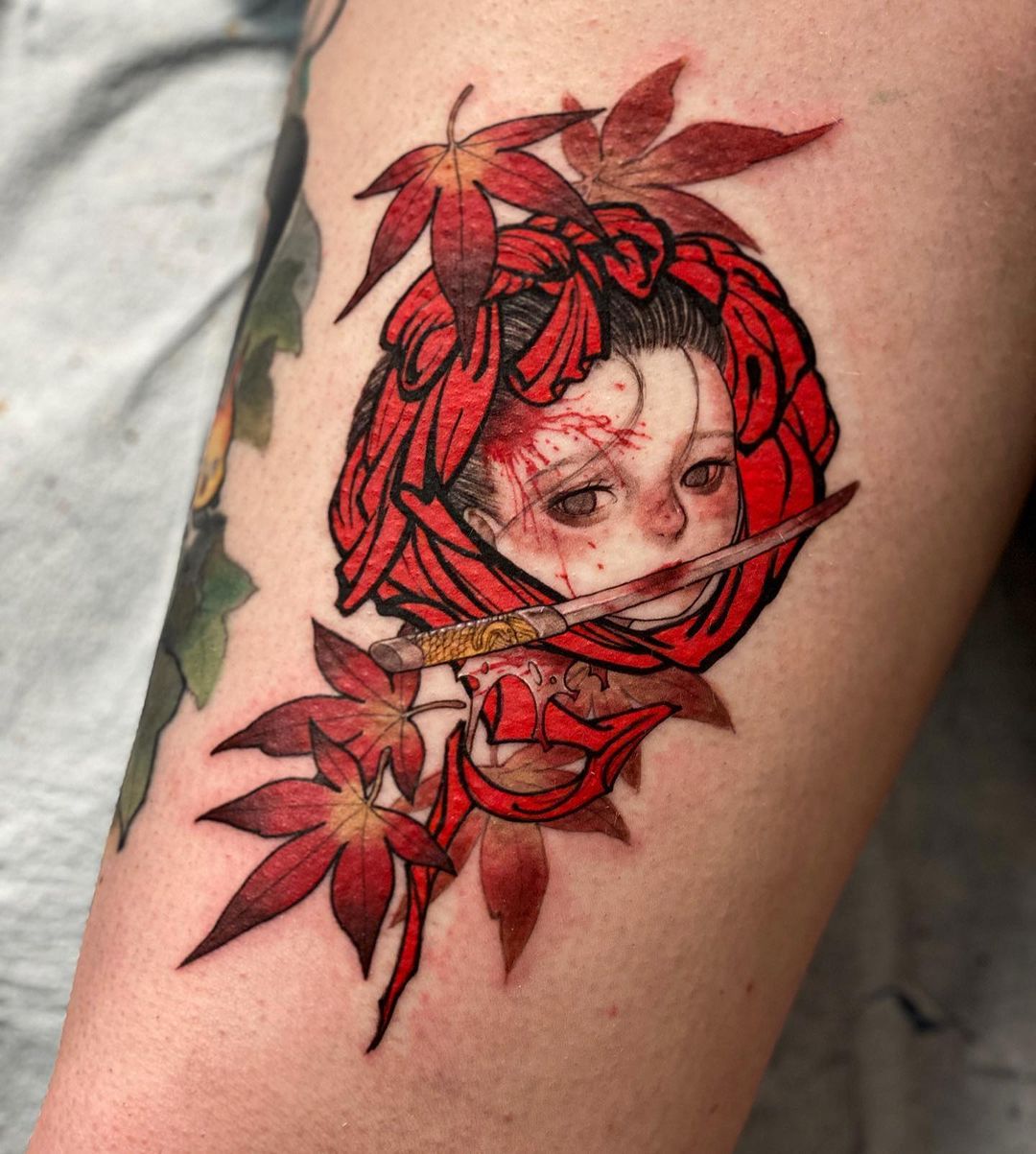 Tatuaje pequeño de un Namakubi Rojo