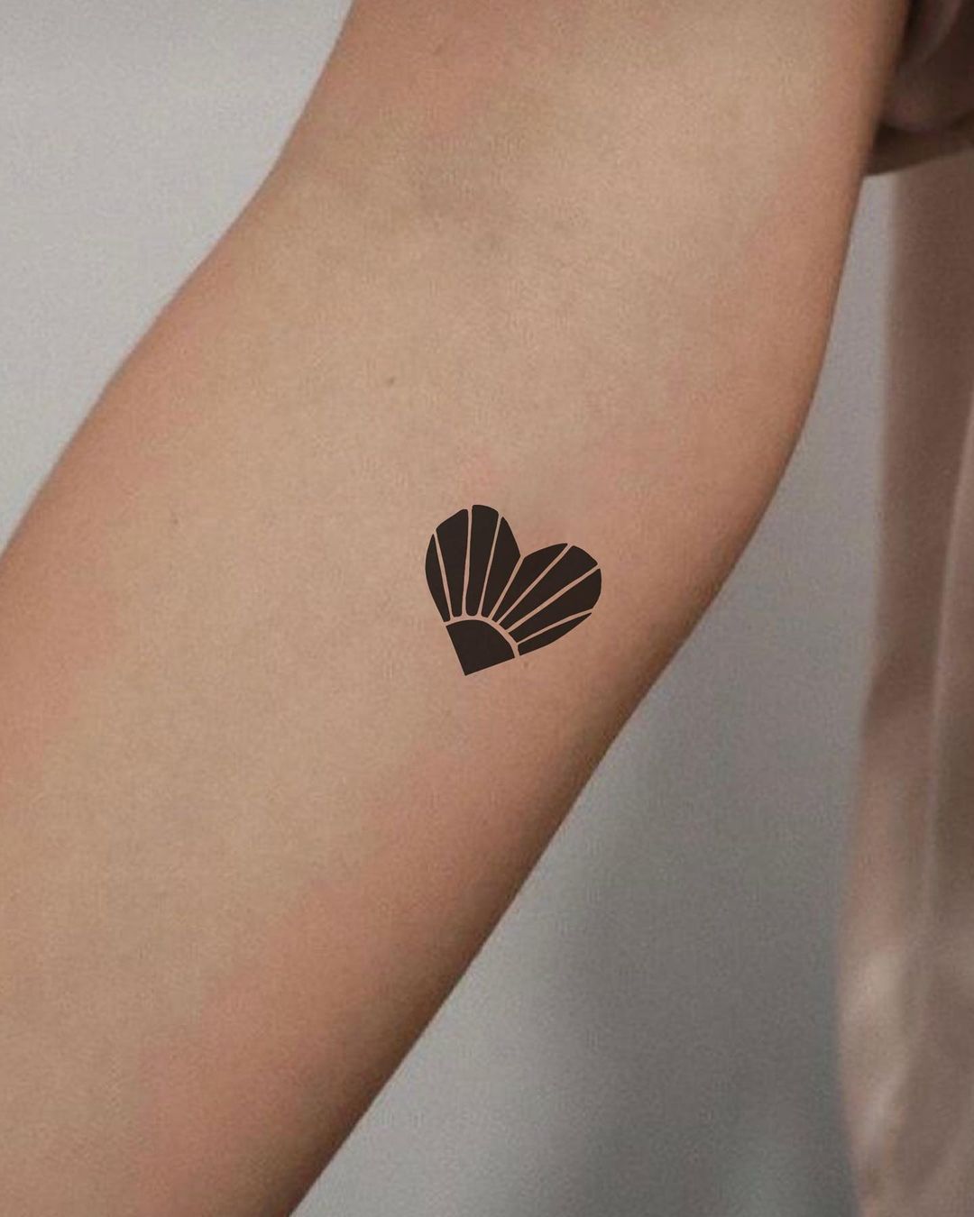 Tatuaje de Corazón Minimalista