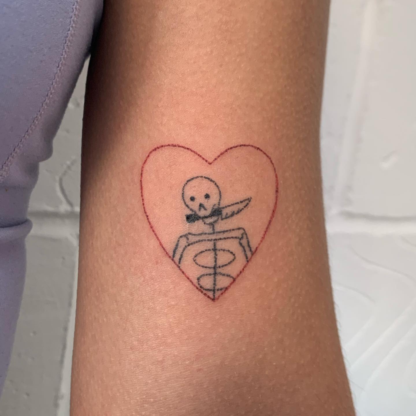 Tatuaje de Corazón y Esqueleto