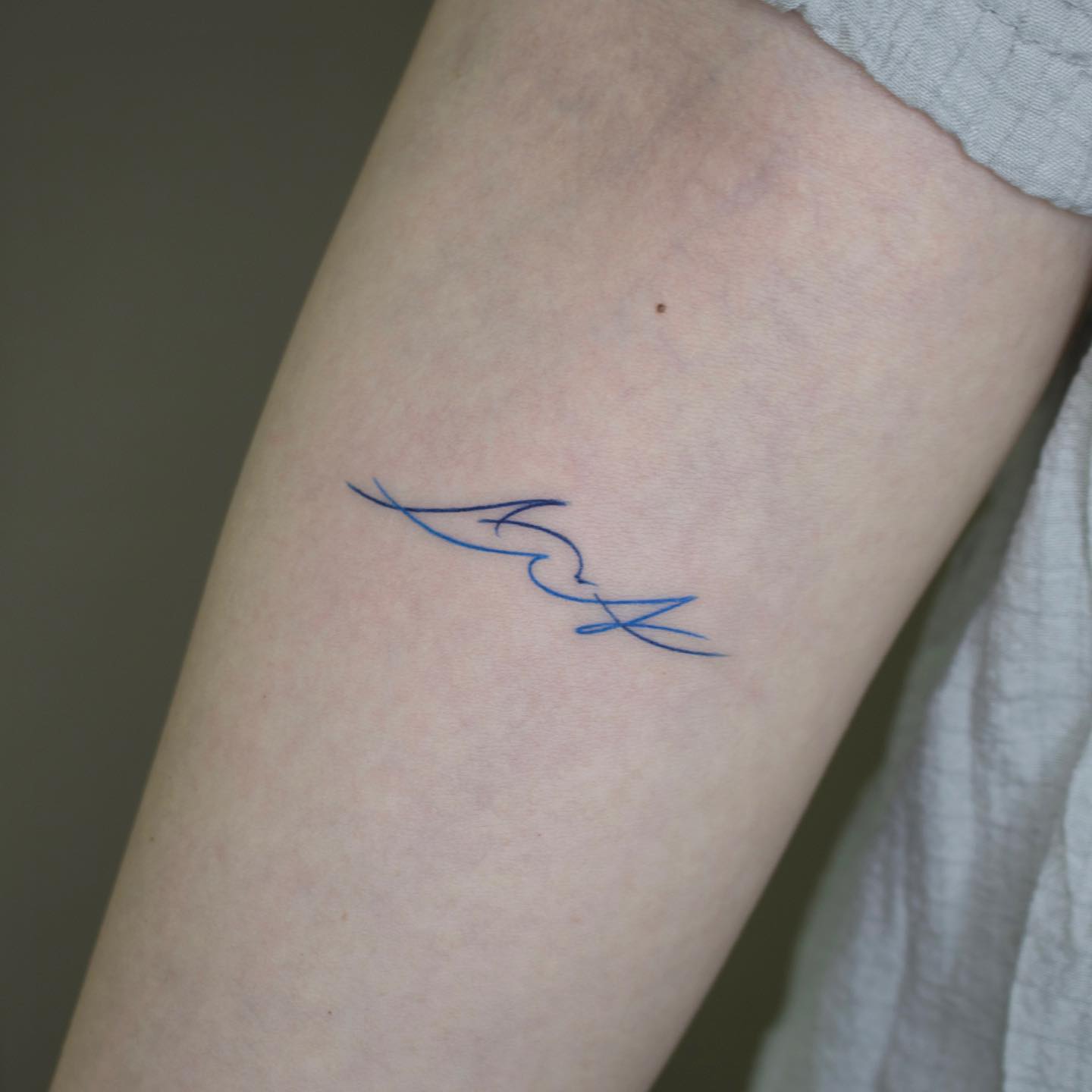 Tatuaje de Ola Súper Pequeña
